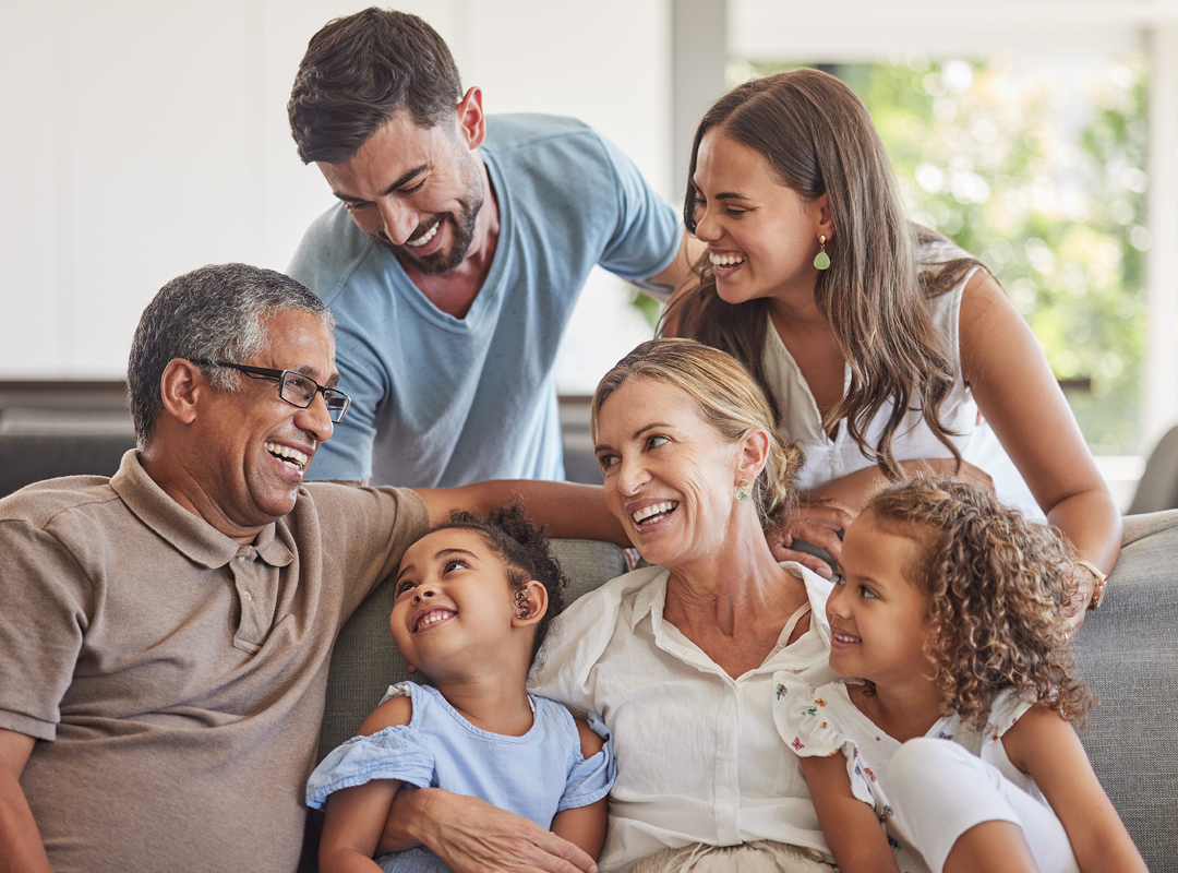 Multi-generational family smiling