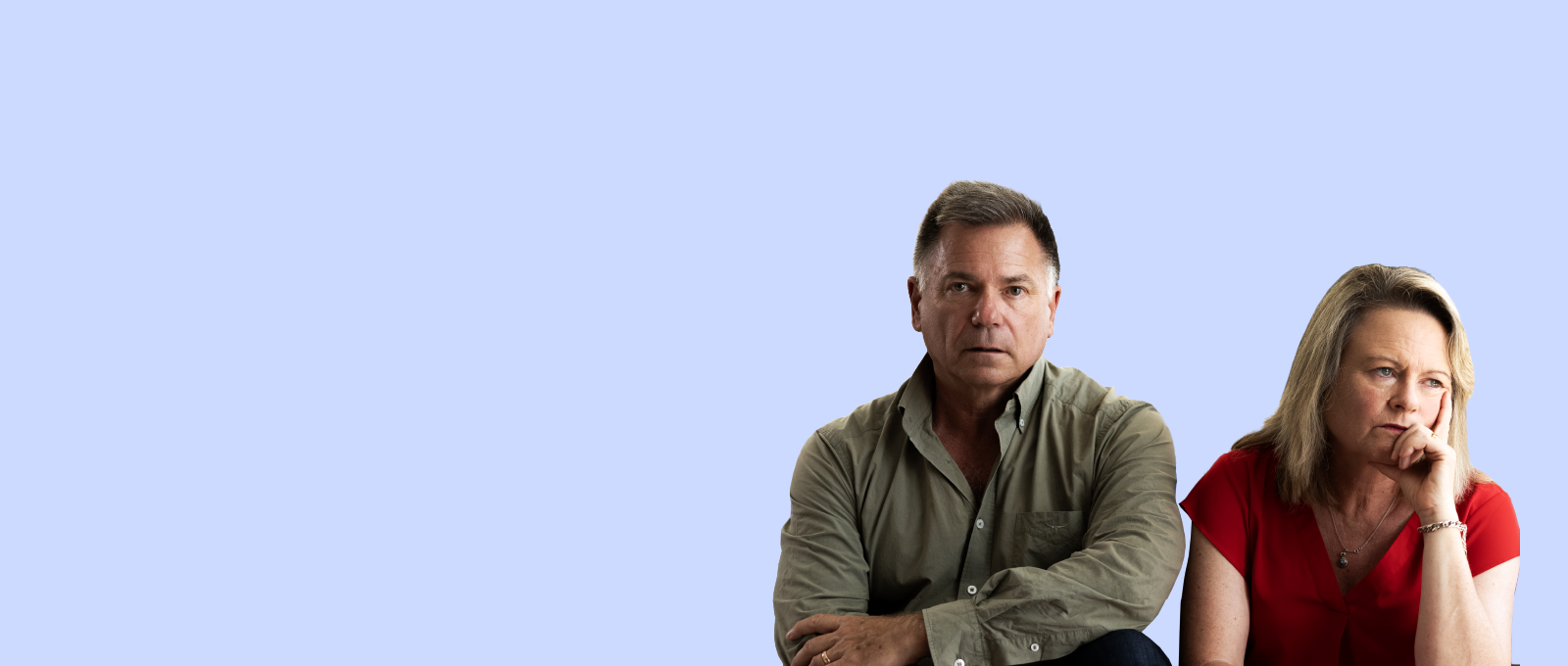 a man sitting with his arms crossed