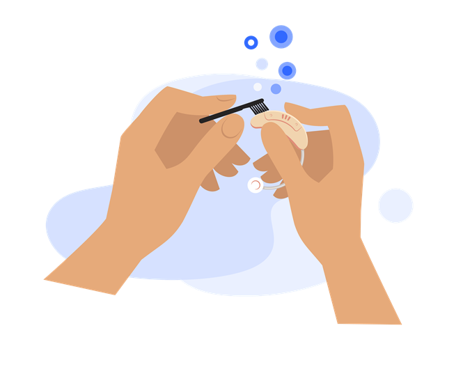 Close-up of a hand carefully cleaning a hearing aid device
