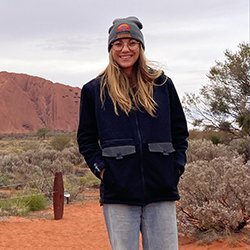Madeleine, Outreach Audiologist and Clinical Operations Manager for Northern Territory at Hearing Australia, smiling warmly