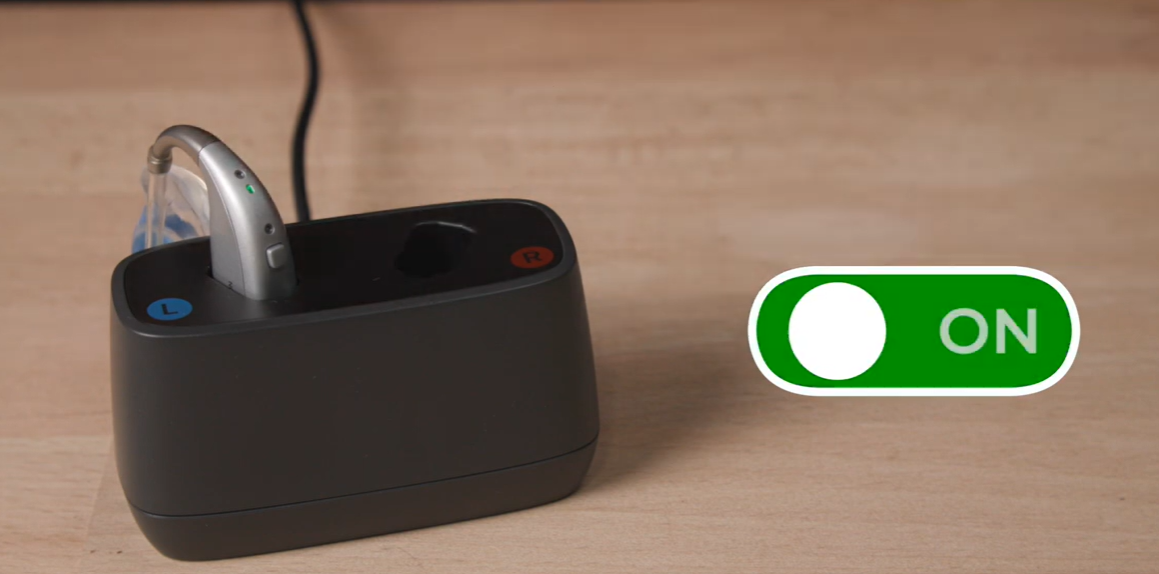a black device with a cord
