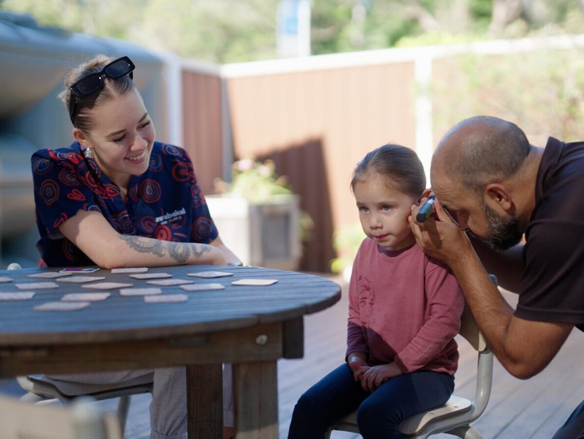 a man and woman playing cards