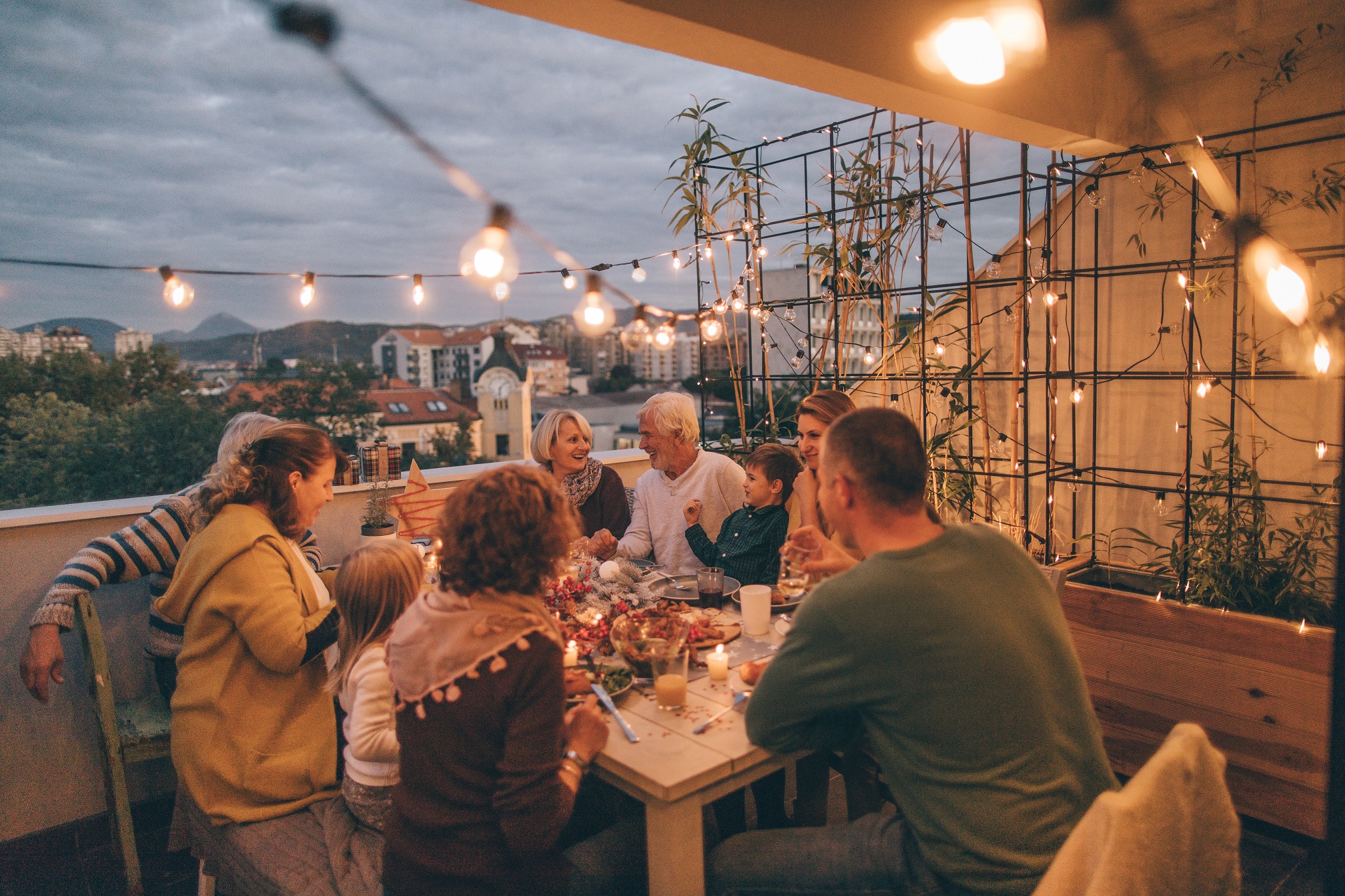 A warm and inviting dinner scene with the whole family gathered around the table